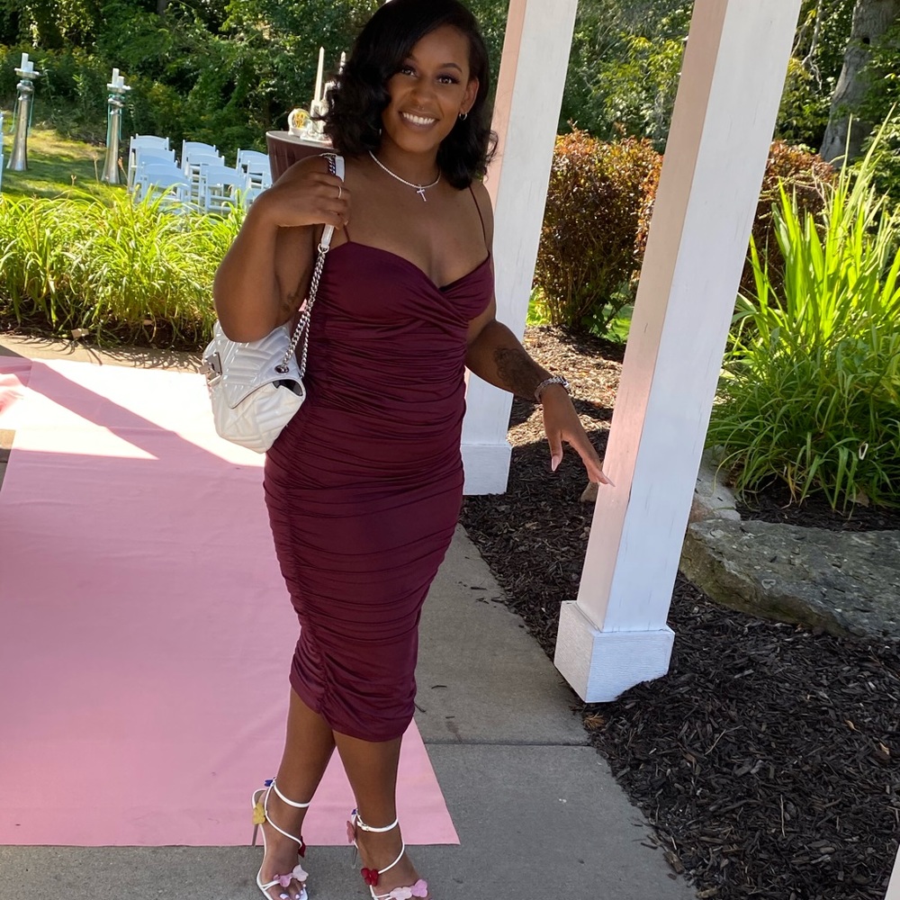 Burgundy ruched dress.
